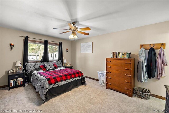 5240 Thomas Rd, Metamora, MI 48455 - carpeted bedroom featuring baseboards and ceiling fan