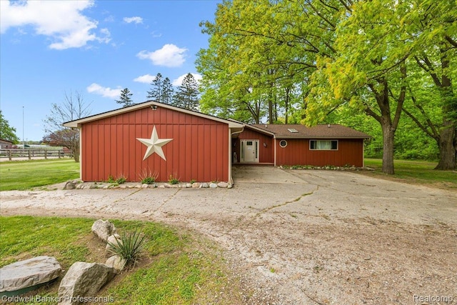 5240 Thomas Rd, Metamora, MI 48455 - view of front of house featuring board and batten siding
