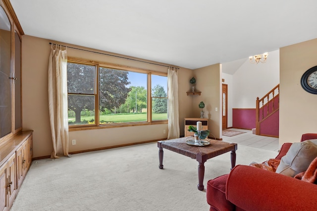 8300 W X Ave, Schoolcraft, MI 49087 - living area with a chandelier, stairs, baseboards, and light carpet