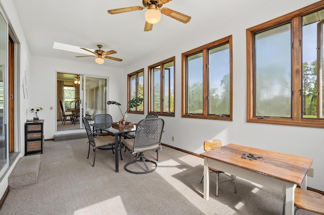 8300 W X Ave, Schoolcraft, MI 49087 - sunroom featuring carpet, baseboards, and a skylight