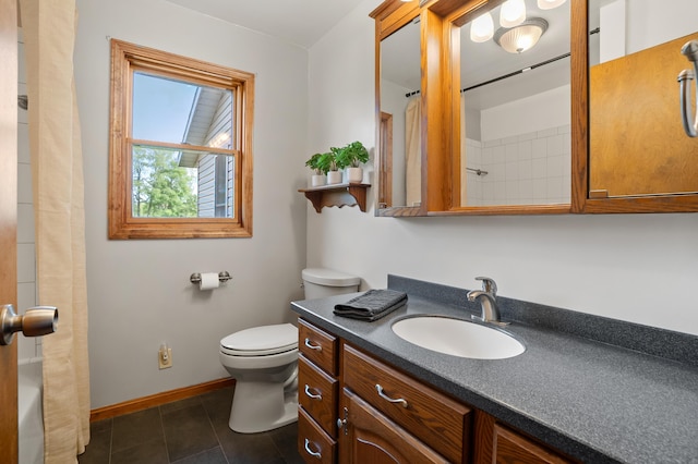 8300 W X Ave, Schoolcraft, MI 49087 - full bath featuring vanity, toilet, baseboards, and tile patterned flooring