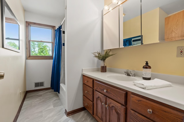 8300 W X Ave, Schoolcraft, MI 49087 - full bath featuring vanity, baseboards, and shower / bath combo with shower curtain