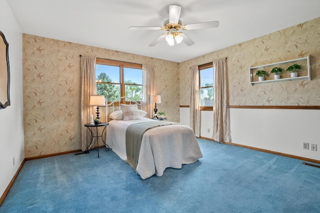 8300 W X Ave, Schoolcraft, MI 49087 - bedroom featuring baseboards, multiple windows, wallpapered walls, and carpet floors