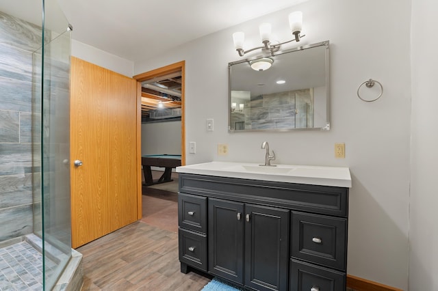 8300 W X Ave, Schoolcraft, MI 49087 - full bath with wood finished floors, vanity, a stall shower, and billiards table