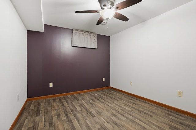 8300 W X Ave, Schoolcraft, MI 49087 - spare room with wood finished floors, ceiling fan, and baseboards