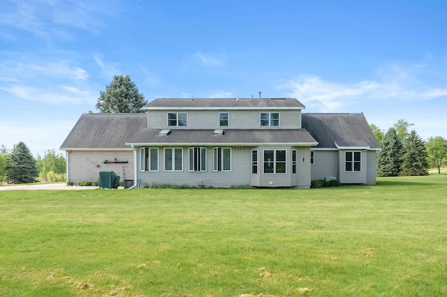 8300 W X Ave, Schoolcraft, MI 49087 - rear view of house featuring a lawn and an attached garage