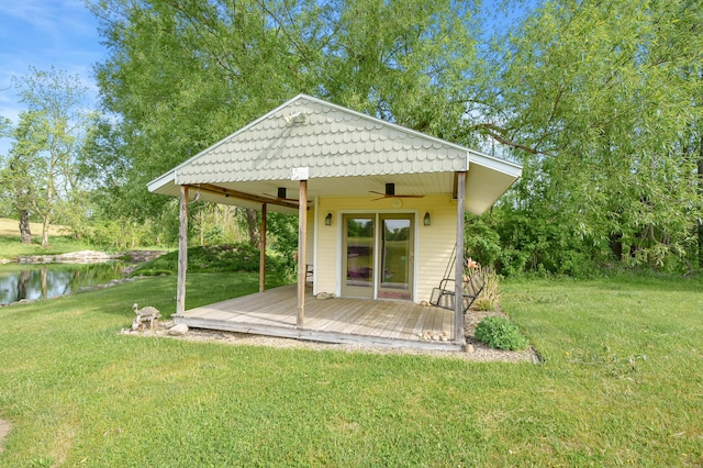 8300 W X Ave, Schoolcraft, MI 49087 - exterior space with a yard, ceiling fan, and a water view