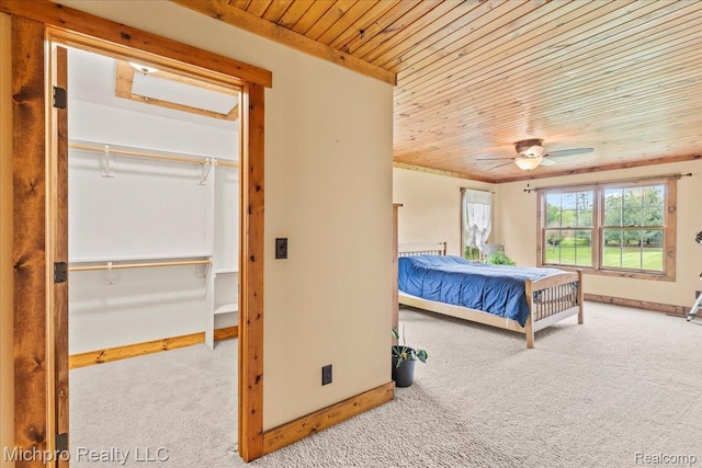 3434 Brown City Rd, Imlay City, MI 48444 - carpeted bedroom with wood ceiling, baseboards, and a ceiling fan