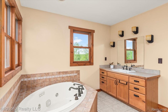 3434 Brown City Rd, Imlay City, MI 48444 - bathroom with vanity, a jetted tub, and tile patterned floors