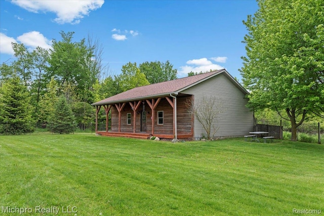 3434 Brown City Rd, Imlay City, MI 48444 - view of front of property featuring a front lawn and covered porch