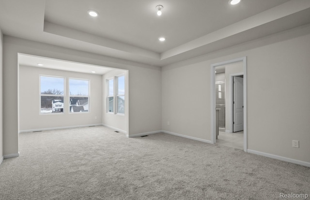 4060 Nottingham Cir, Clarkston, MI 48346 - empty room with light carpet, recessed lighting, baseboards, and a raised ceiling