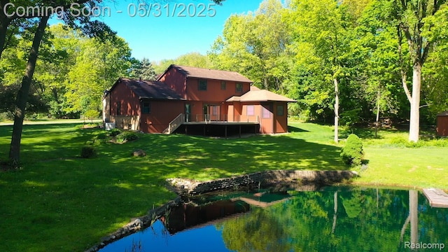 8210 Pine Ridge Dr, Clarkston, MI 48346 - back of property with a lawn and a deck