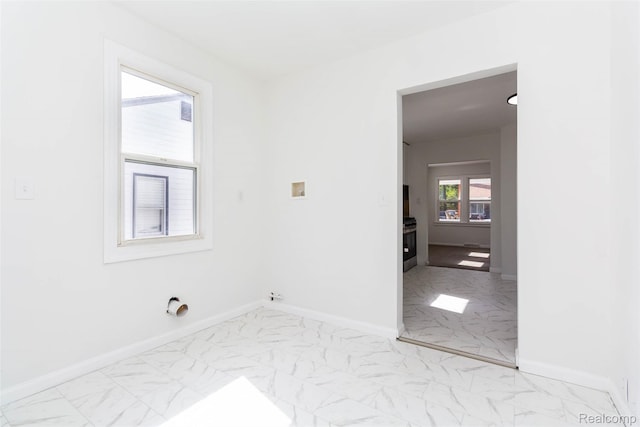 8713 Hupp Ave, Warren, MI 48089 - spare room with light marble finish floors and baseboards