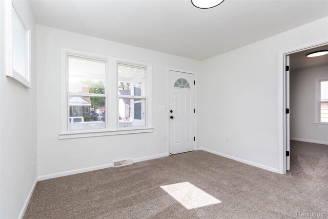 8713 Hupp Ave, Warren, MI 48089 - foyer featuring carpet flooring and baseboards