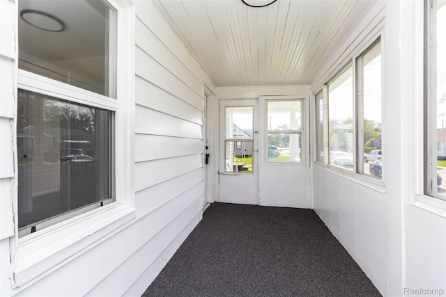8713 Hupp Ave, Warren, MI 48089 - unfurnished sunroom with carpet and wooden ceiling