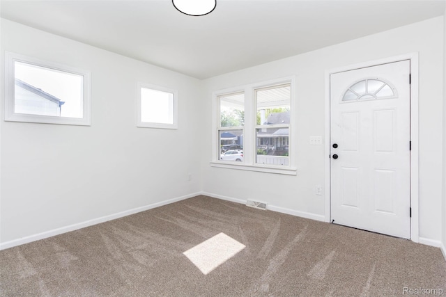 8713 Hupp Ave, Warren, MI 48089 - entryway with carpet floors and baseboards