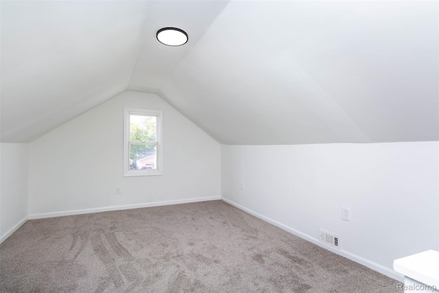 8713 Hupp Ave, Warren, MI 48089 - bonus room featuring carpet flooring, lofted ceiling, and baseboards