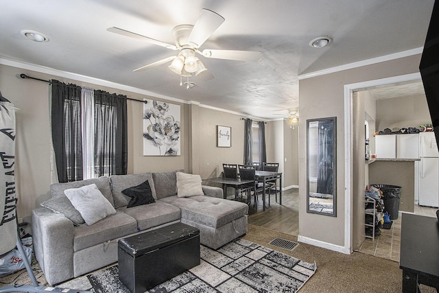 2149 Luella St, Kalamazoo, MI 49001 - living room with a ceiling fan, ornamental molding, and baseboards