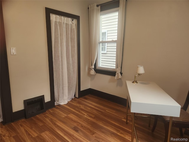 428 E Milton Ave, Hazel Park, MI 48030 - unfurnished bedroom with dark wood finished floors and baseboards