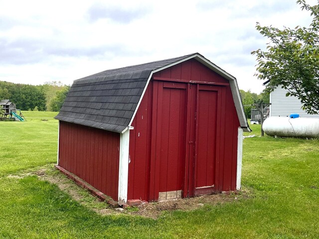 132 W Lansing Rd, Morrice, MI 48857 - view of shed featuring a playground