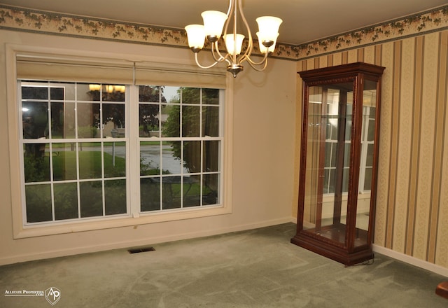 3478 N Gale Rd, Davison, MI 48423 - unfurnished dining area with a chandelier, carpet, baseboards, and wallpapered walls