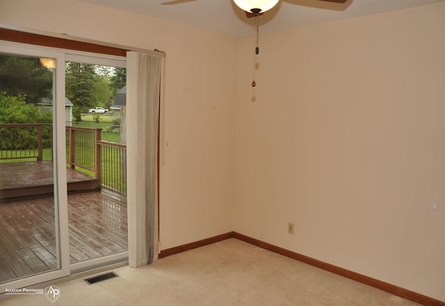 3478 N Gale Rd, Davison, MI 48423 - spare room featuring a ceiling fan, light carpet, and baseboards