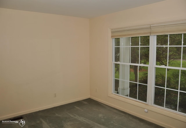 3478 N Gale Rd, Davison, MI 48423 - unfurnished room featuring dark colored carpet and baseboards