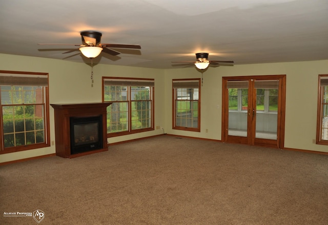 3478 N Gale Rd, Davison, MI 48423 - unfurnished living room featuring baseboards, a ceiling fan, and a glass covered fireplace
