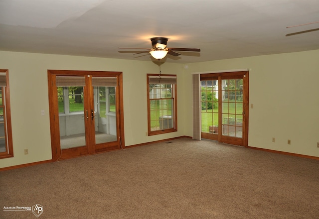 3478 N Gale Rd, Davison, MI 48423 - carpeted empty room featuring a ceiling fan, french doors, plenty of natural light, and baseboards