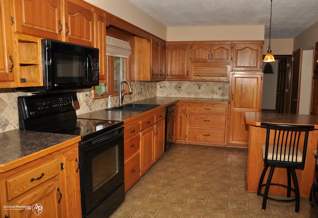 3478 N Gale Rd, Davison, MI 48423 - kitchen featuring black appliances, a sink, tasteful backsplash, and brown cabinets