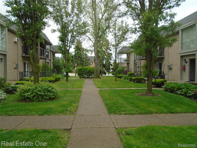 1727 E 14 Mile Rd Unit A, Birmingham, MI 48009 - view of property's community with a yard and a residential view
