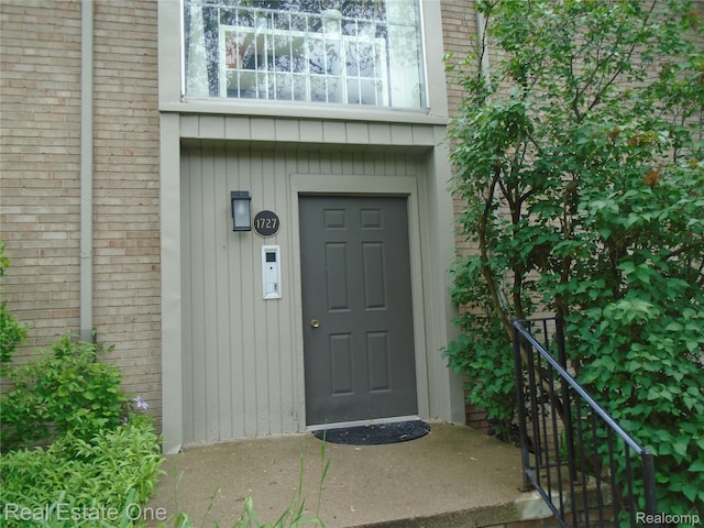 1727 E 14 Mile Rd Unit A, Birmingham, MI 48009 - property entrance featuring brick siding
