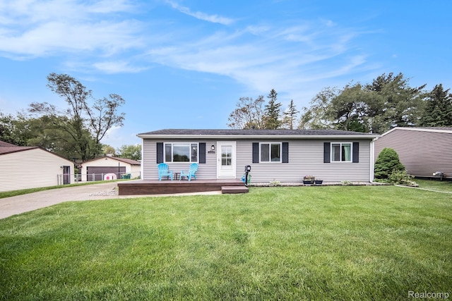 820 Devonshire Blvd, Brighton, MI 48116 - view of front of home with a garage, a front yard, and an outdoor structure