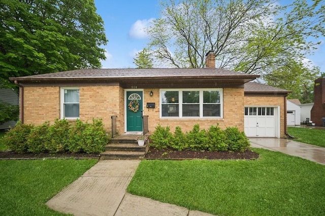 514 Granada Ave, Saint Joseph, MI 49085 - ranch-style house with a garage, a front yard, driveway, a chimney, and brick siding
