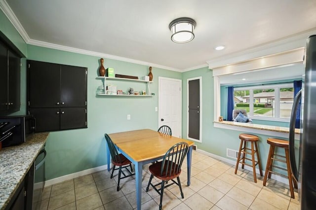 514 Granada Ave, Saint Joseph, MI 49085 - dining area featuring ornamental molding, light tile patterned flooring, and baseboards