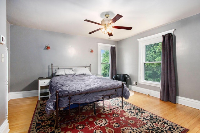 110 N O Keefe St, Cassopolis, MI 49031 - bedroom featuring wood finished floors, baseboards, and a ceiling fan