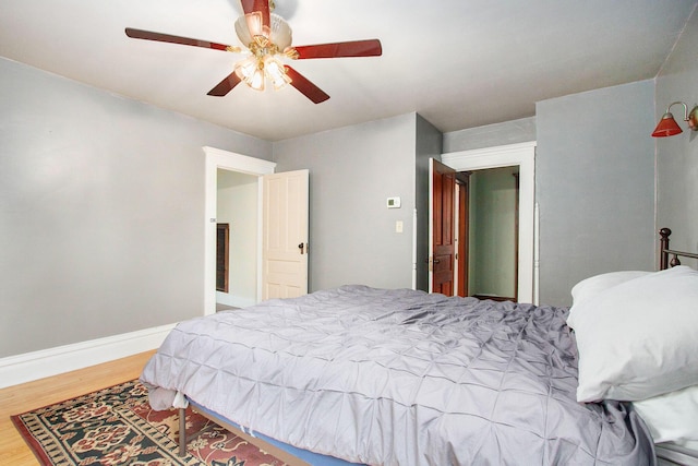 110 N O Keefe St, Cassopolis, MI 49031 - bedroom with wood finished floors, ceiling fan, and baseboards