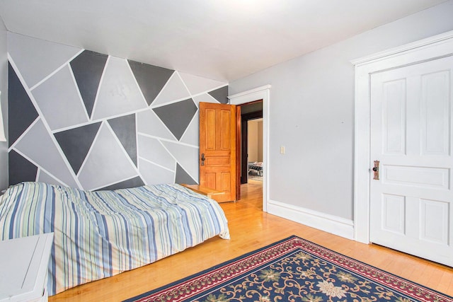 110 N O Keefe St, Cassopolis, MI 49031 - bedroom featuring wood finished floors and baseboards