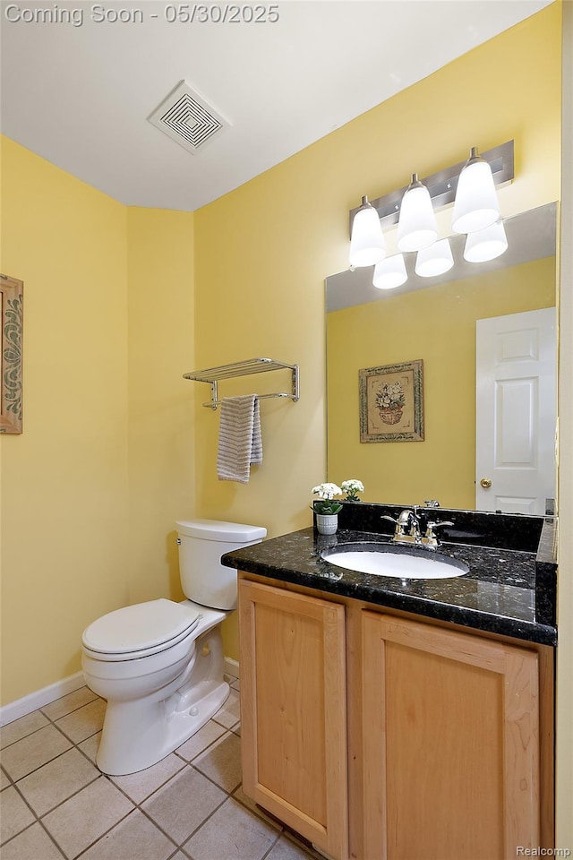 16106 Nathan Dr, Macomb, MI 48044 - half bathroom featuring vanity, toilet, tile patterned flooring, and baseboards