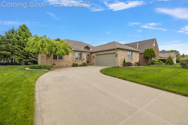 16106 Nathan Dr, Macomb, MI 48044 - view of front facade featuring brick siding, concrete driveway, a garage, and a front yard