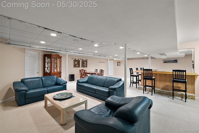 16106 Nathan Dr, Macomb, MI 48044 - living room with bar, baseboards, and recessed lighting