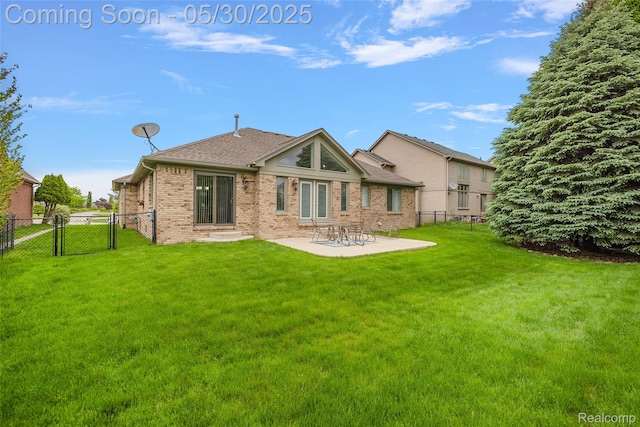 16106 Nathan Dr, Macomb, MI 48044 - rear view of property featuring a gate, brick siding, a patio area, and a shingled roof