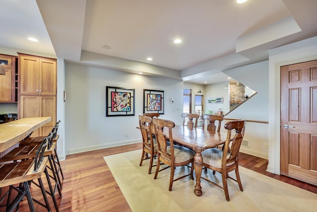 210 E Water St, New Buffalo, MI 49117 - dining room featuring baseboards, light wood-type flooring, and recessed lighting