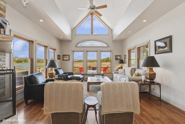 210 E Water St, New Buffalo, MI 49117 - living area featuring lofted ceiling, healthy amount of natural light, wood finished floors, ceiling fan, and recessed lighting
