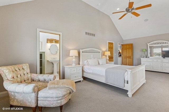 210 E Water St, New Buffalo, MI 49117 - carpeted bedroom with high vaulted ceiling, ensuite bath, and a ceiling fan
