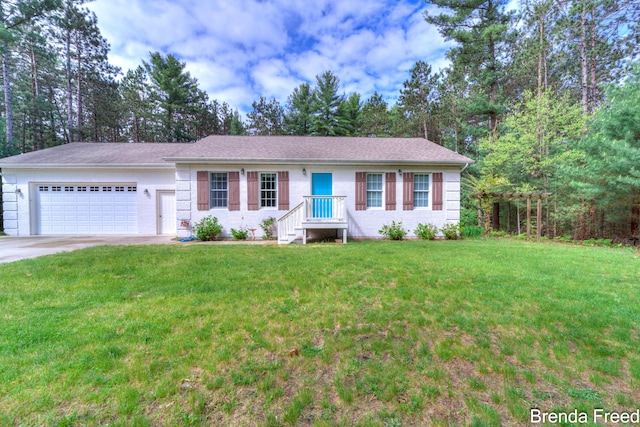 7561 Wiczer Dr, Whitehall, MI 49461 - ranch-style home with a garage, driveway, and a front lawn