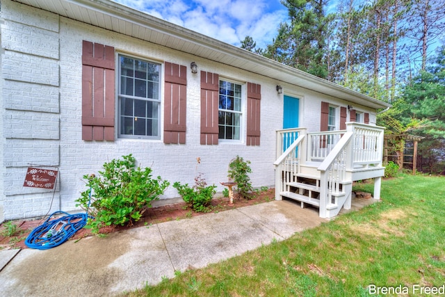 7561 Wiczer Dr, Whitehall, MI 49461 - ranch-style home featuring a front yard and brick siding