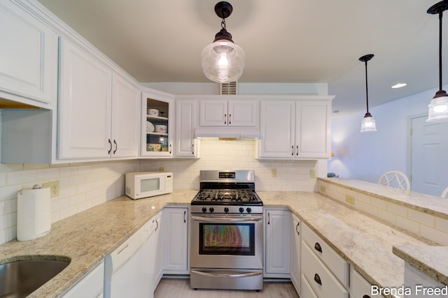 7561 Wiczer Dr, Whitehall, MI 49461 - kitchen featuring white appliances, white cabinets, tasteful backsplash, and glass insert cabinets