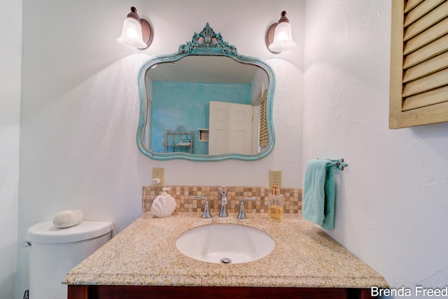 7561 Wiczer Dr, Whitehall, MI 49461 - bathroom featuring vanity and toilet