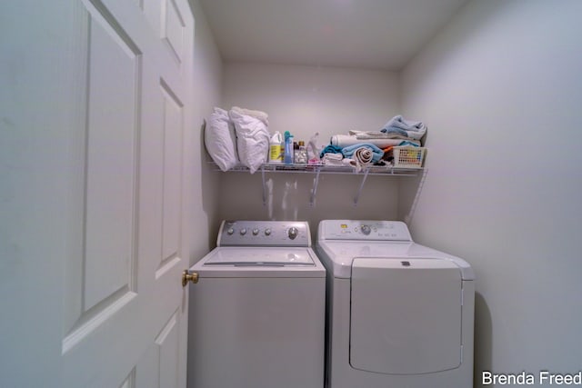 7561 Wiczer Dr, Whitehall, MI 49461 - laundry area featuring separate washer and dryer